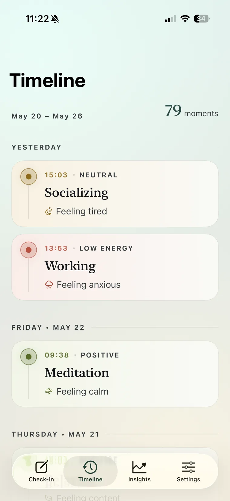 The Timeline screen — moments grouped by day, each tagged with its energy band and feeling.